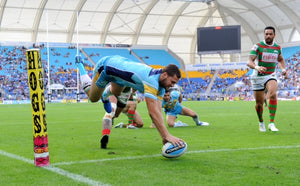 Anthony Don, NRL Gold Coast during NRL game placing the ball down for a try.
