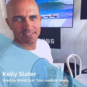 Kelly Slater holding Blue Healer Care tubes on WSL Tour
